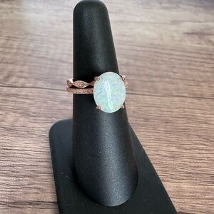 925 Plated Rose Gold with Opal Solitaire and twisted CZ band rings